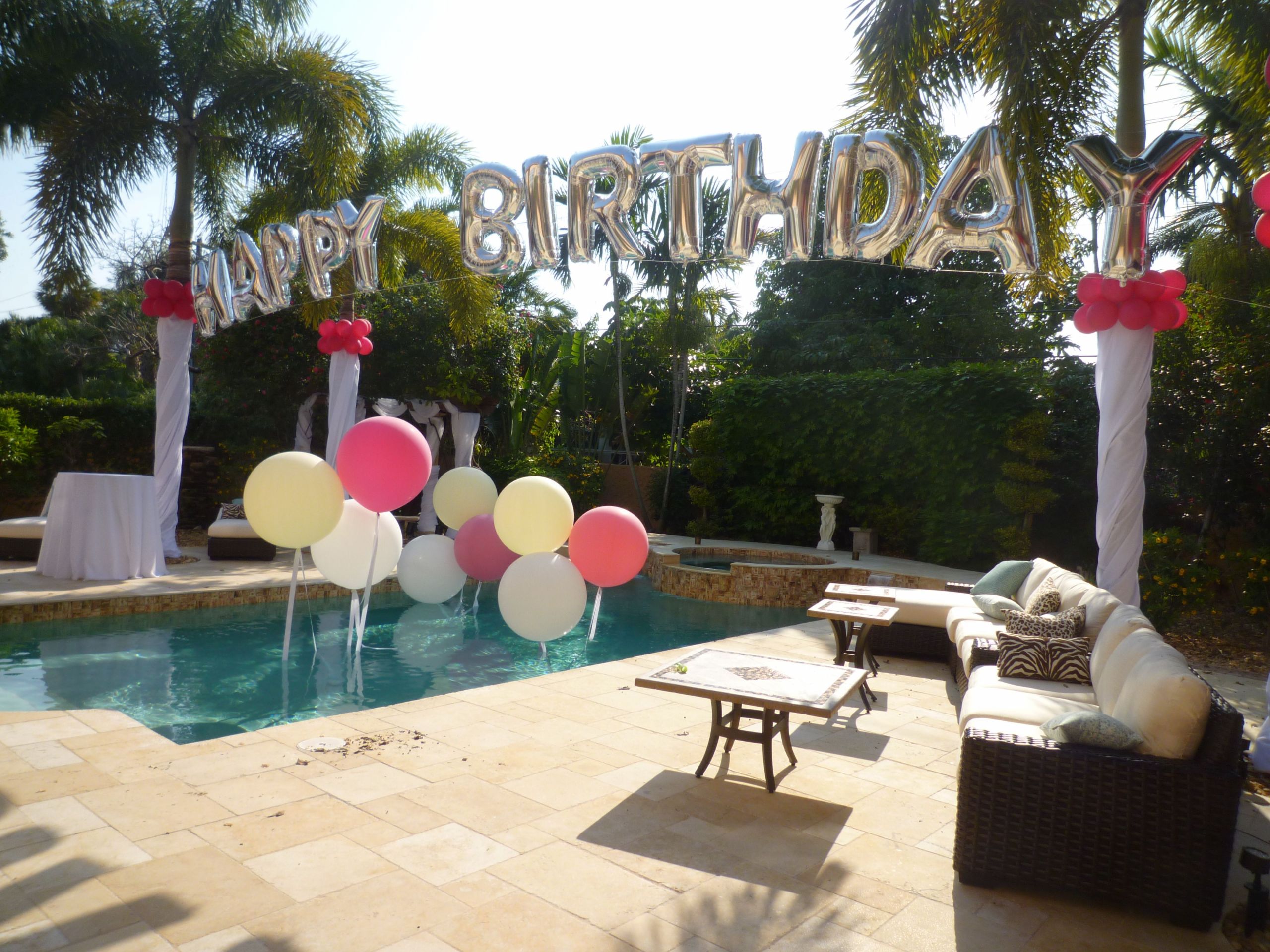 Ideas For Backyard Girls Birthday Pool Party
 Birthday balloon arch over a swimming pool Backyard party