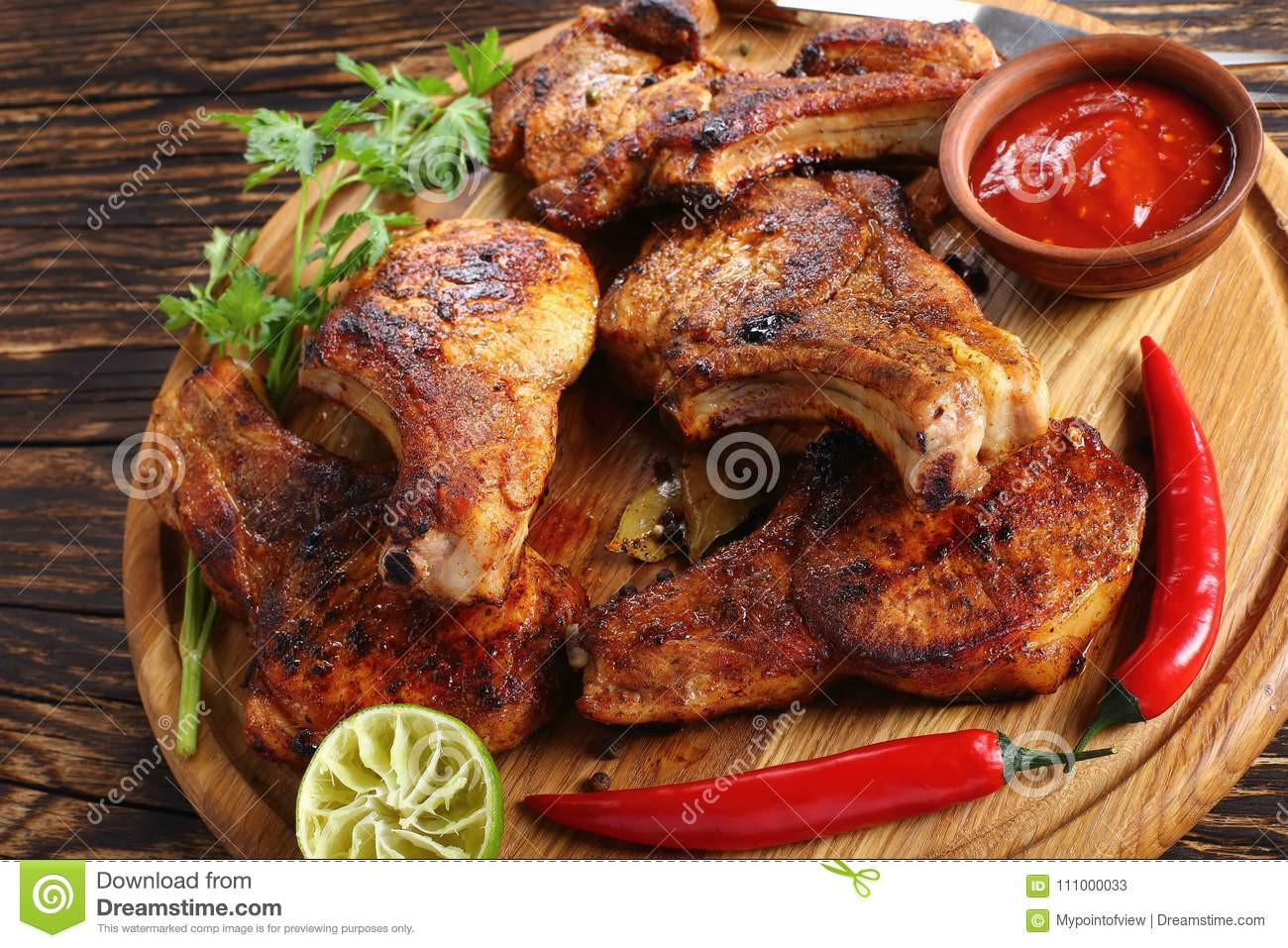 Juicy Grilled Pork Chops
 Hot Juicy Grilled Pork Chops Close up Stock Image Image