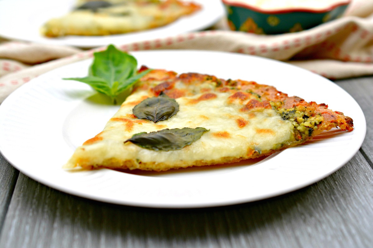 Keto Chicken Pizza
 Keto Pizza with Chicken Crust and Pesto Mess for Less