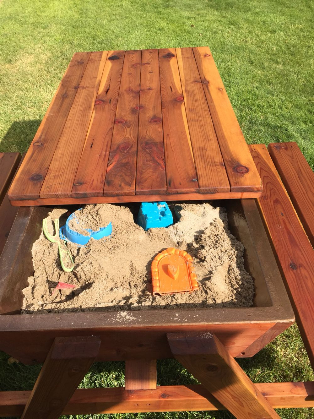 Kids Outdoor Picnic Table
 Picnic table with built in sand box for the kids Sandbox