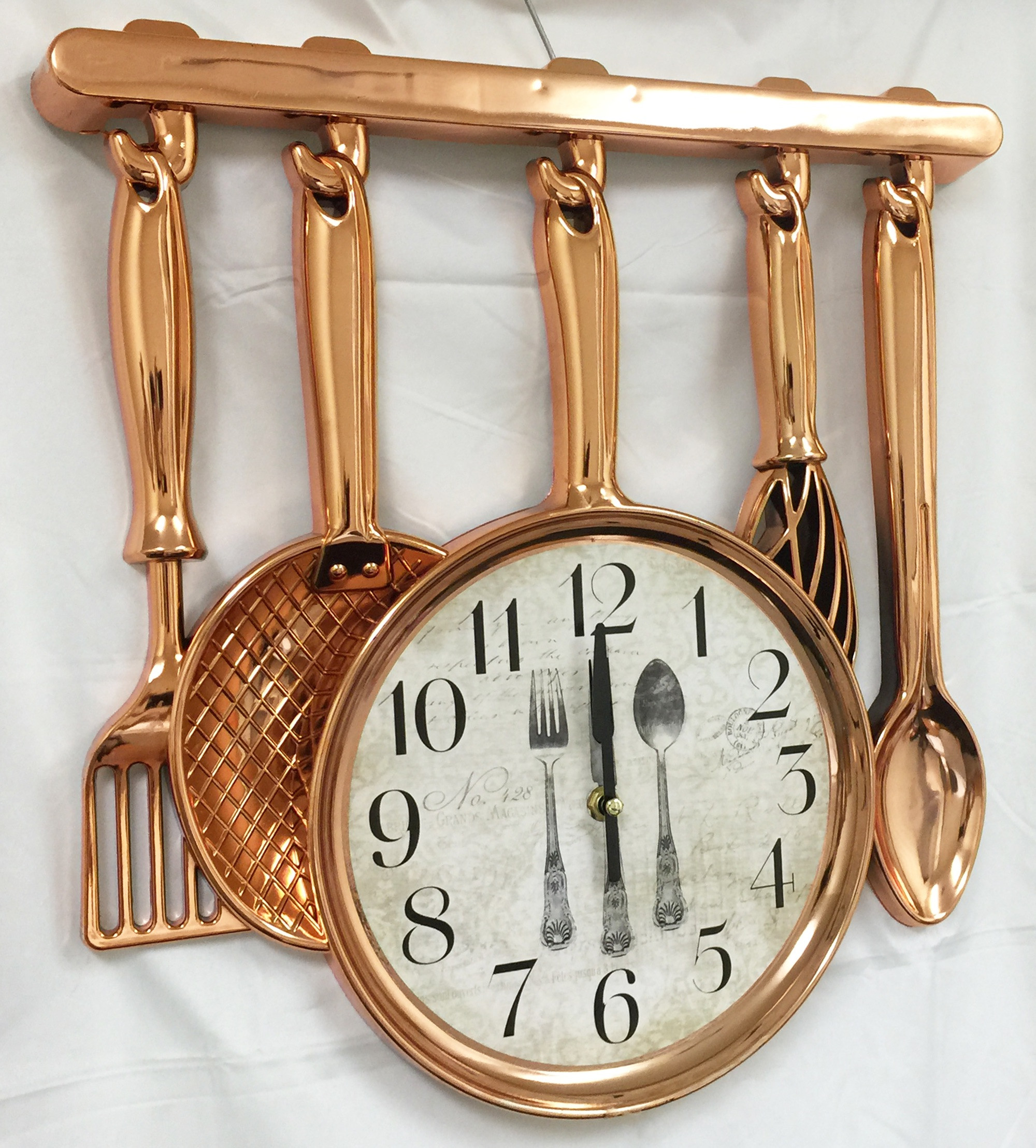 Kitchen Wall Clocks
 Creative Motion Industries Kitchen Clock in Copper Color
