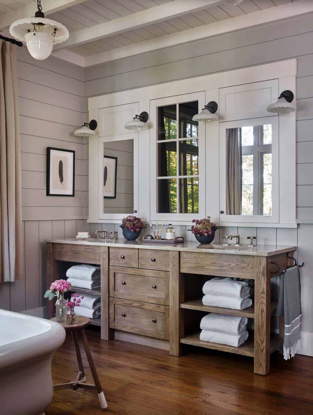 Lake Bathroom Decor
 Whimsical lakeside cottage retreat with cozy interiors on