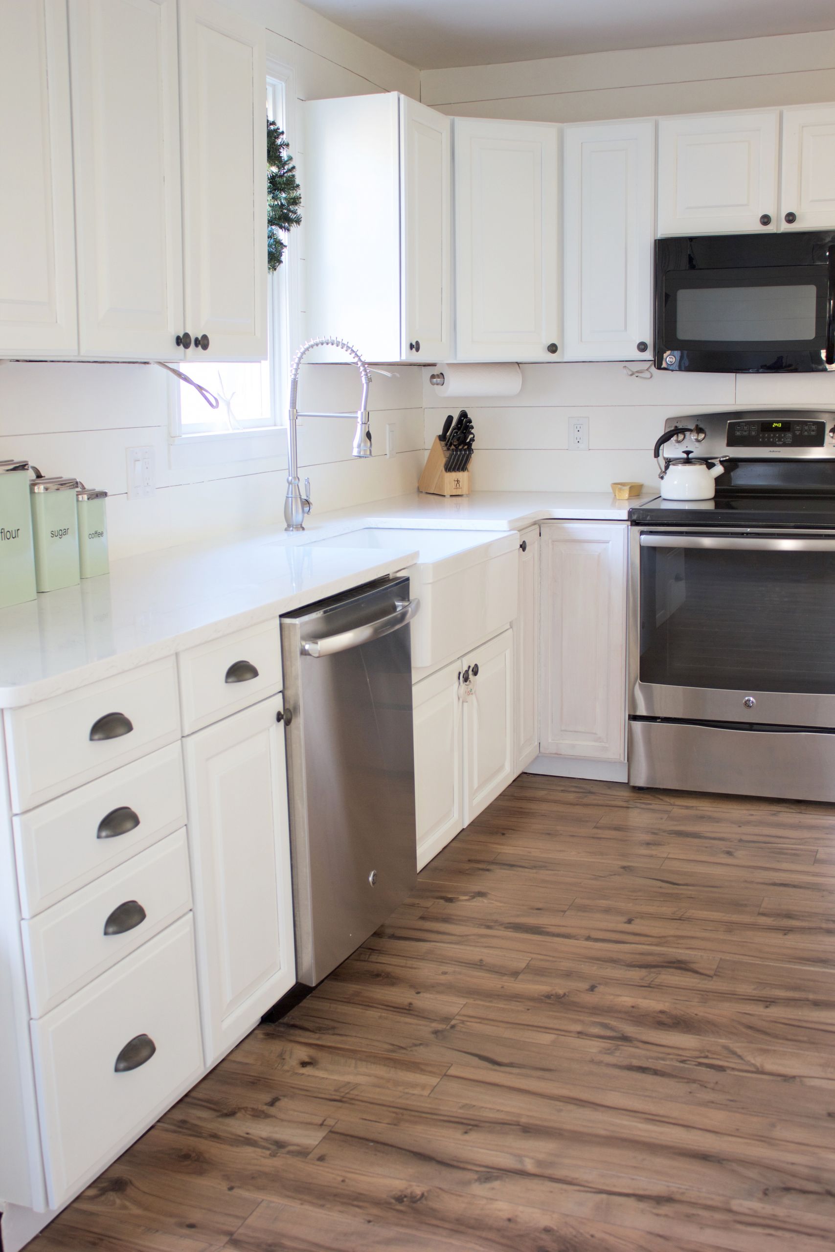 Laminate Flooring Kitchen
 Kitchen Progress Pergo Flooring Before and After Lauren