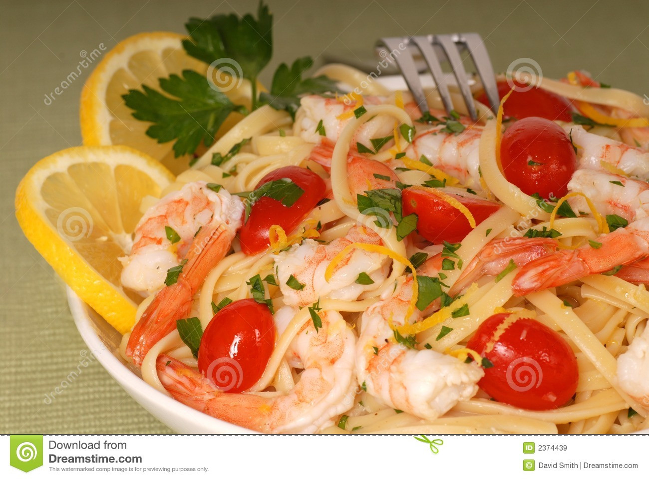 Lemon Pasta With Shrimp
 Lemon pasta with shrimp stock image Image of green fork