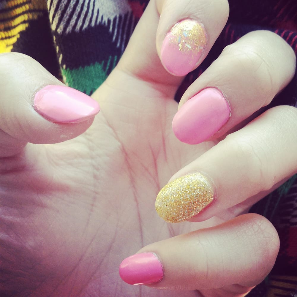 Light Pink Nails With Gold Glitter
 Full set light neon pink gold with silver glitter ombre