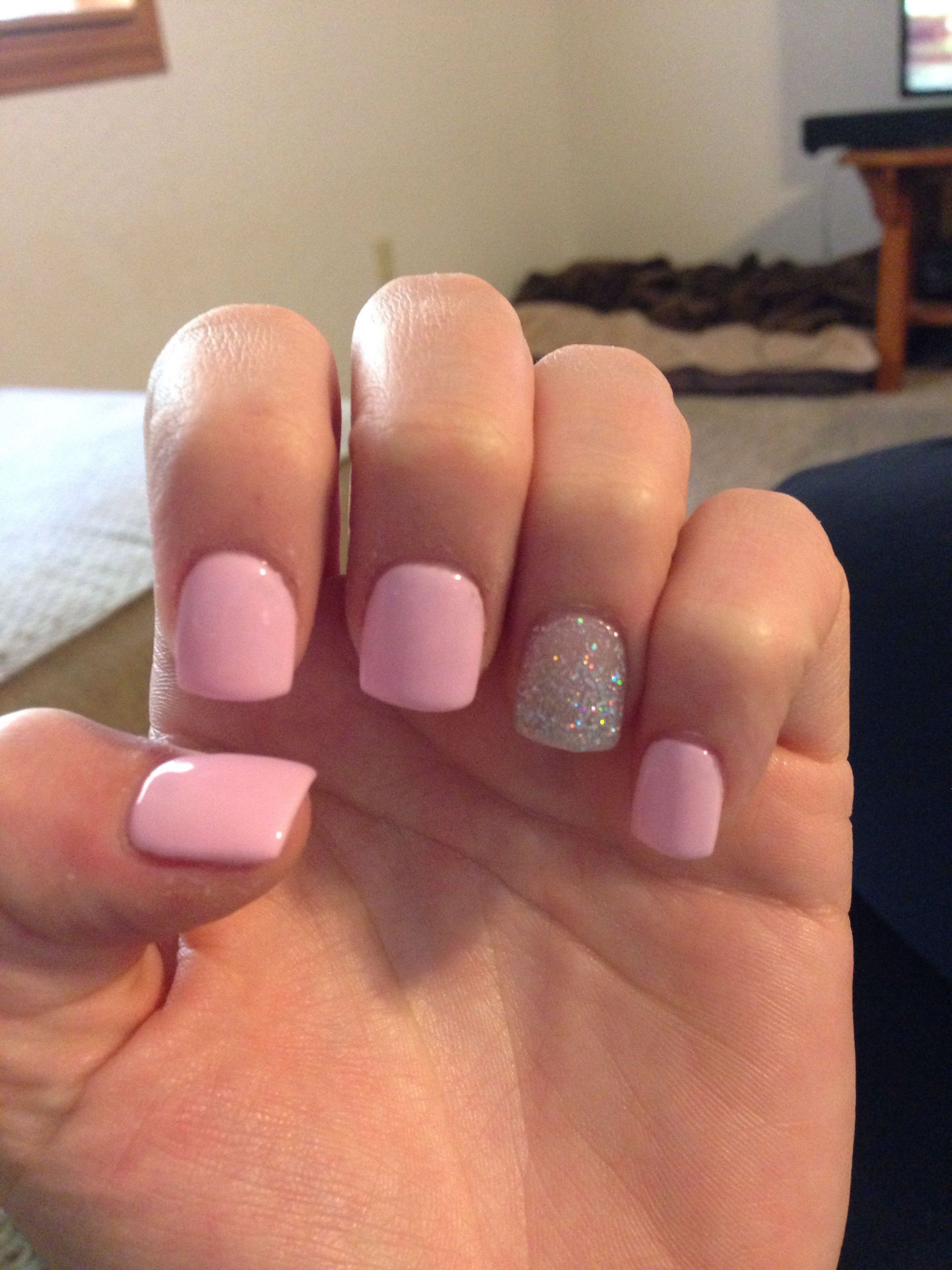 Light Pink Nails With Gold Glitter
 Light pink with silver glitter accent nail