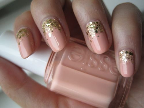 Light Pink Nails With Gold Glitter
 Light pink nails with gold glitter