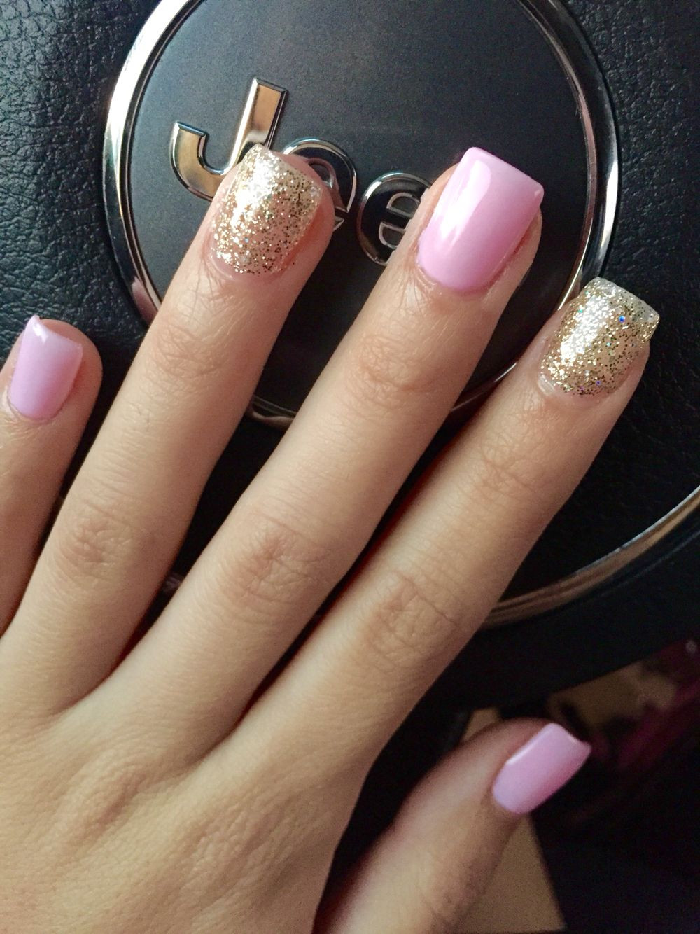 Light Pink Nails With Gold Glitter
 Light pink and gold glitter nails