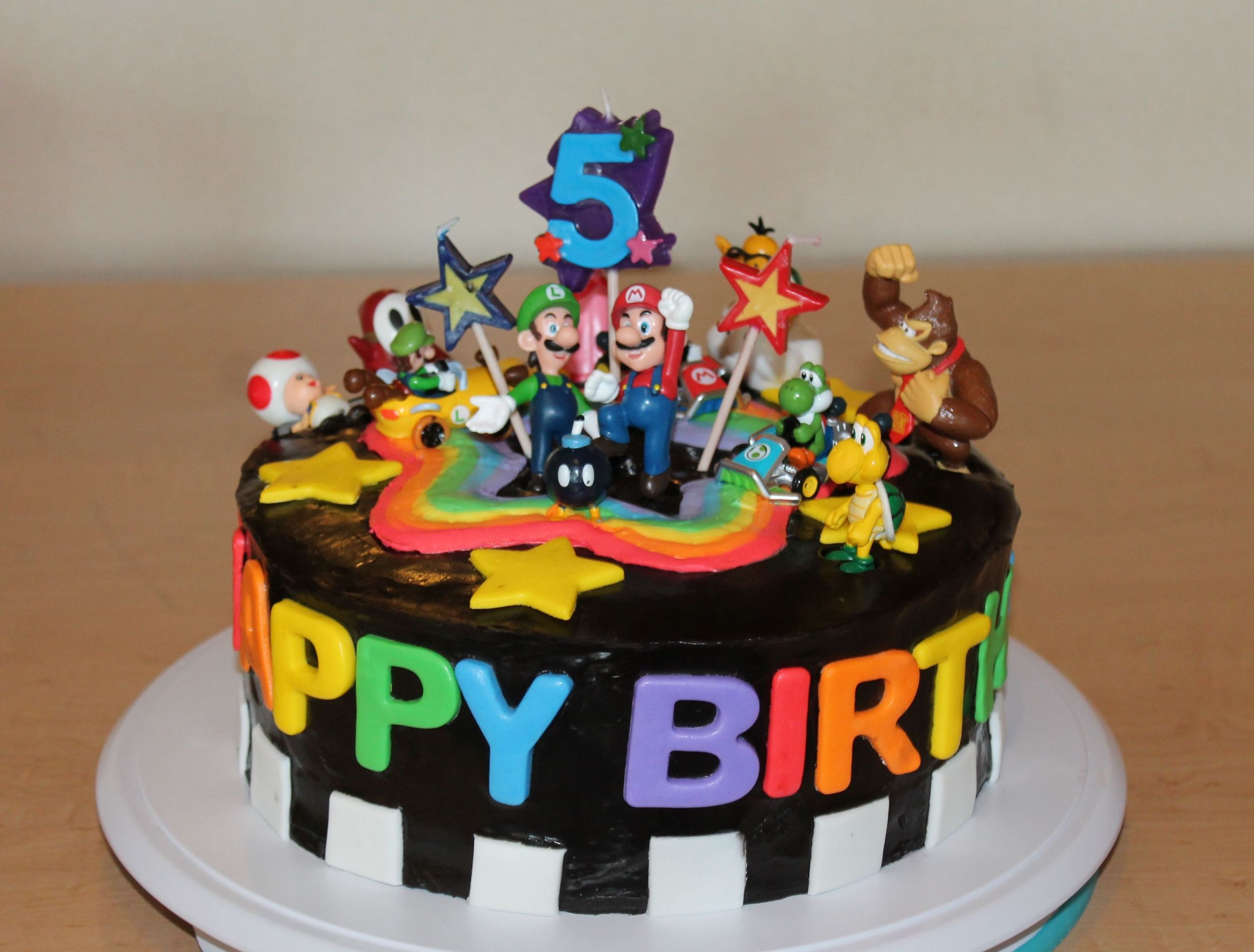 Mario Kart Birthday Cake
 Mario Kart Rainbow Road Cake And the best part It s a