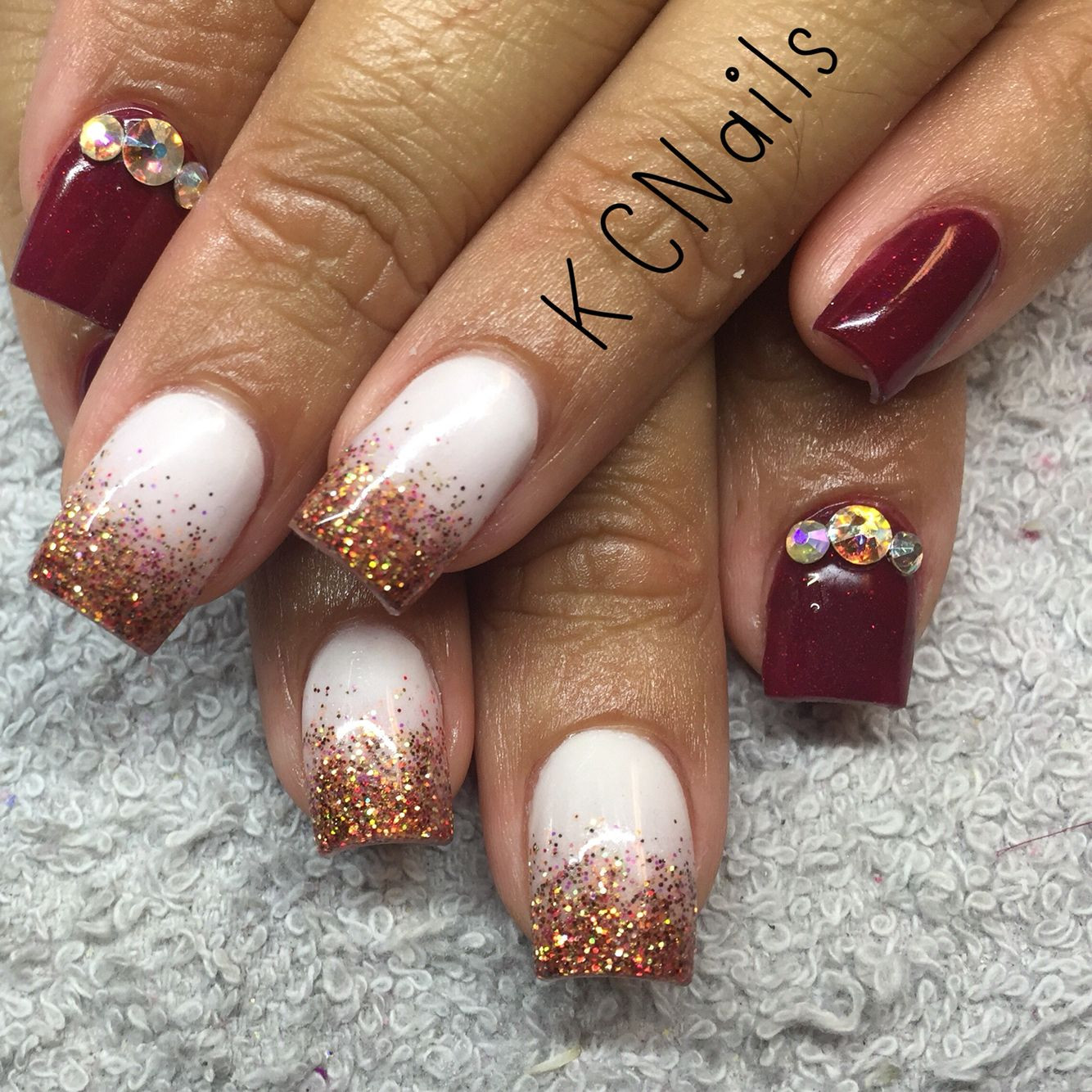 Maroon Glitter Nails
 Maroon burgundy and white acrylic nails with fall glitter