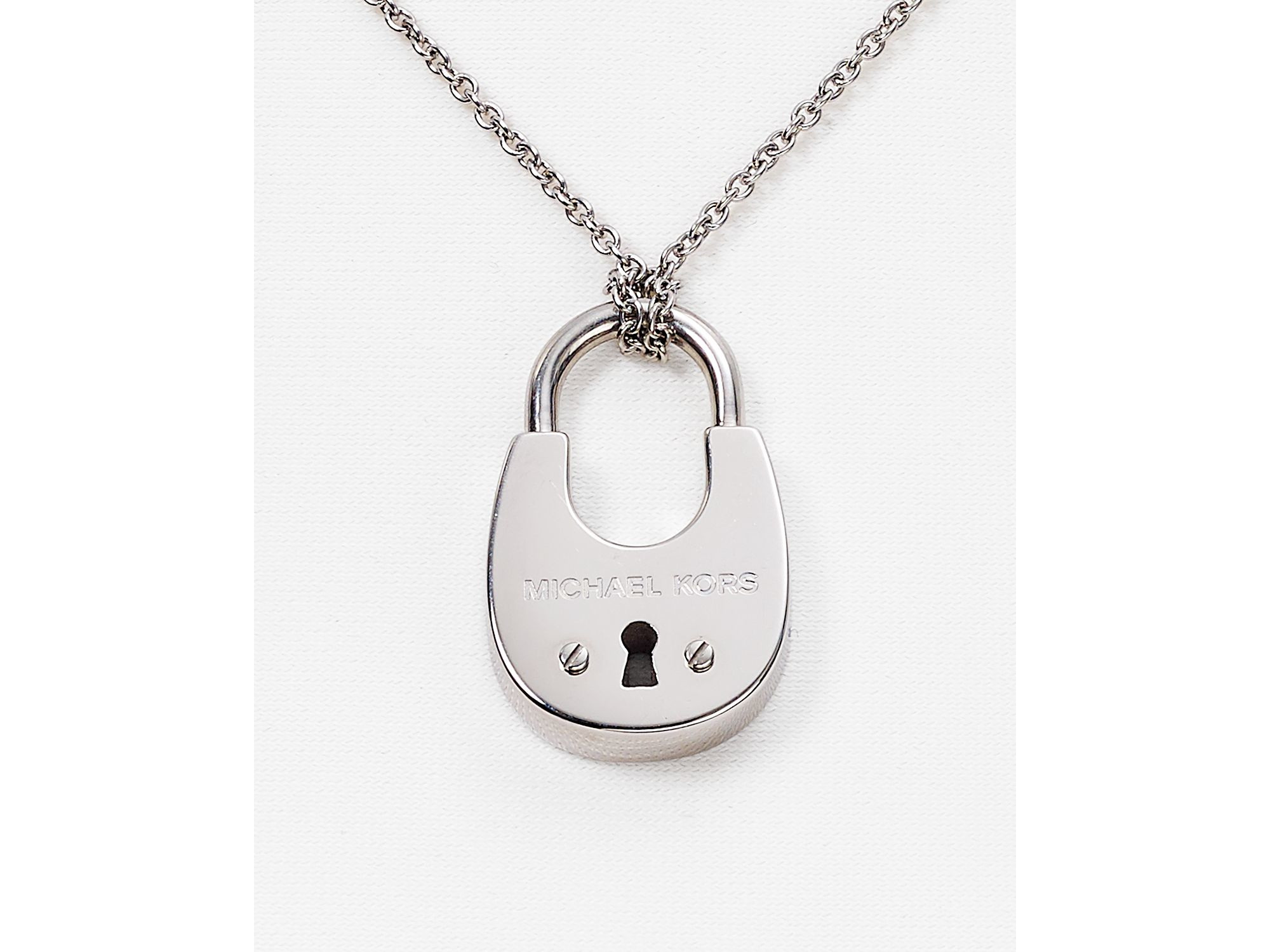 Michael Kors Lock Necklace
 Michael kors Padlock Pendant Necklace 16" in Silver