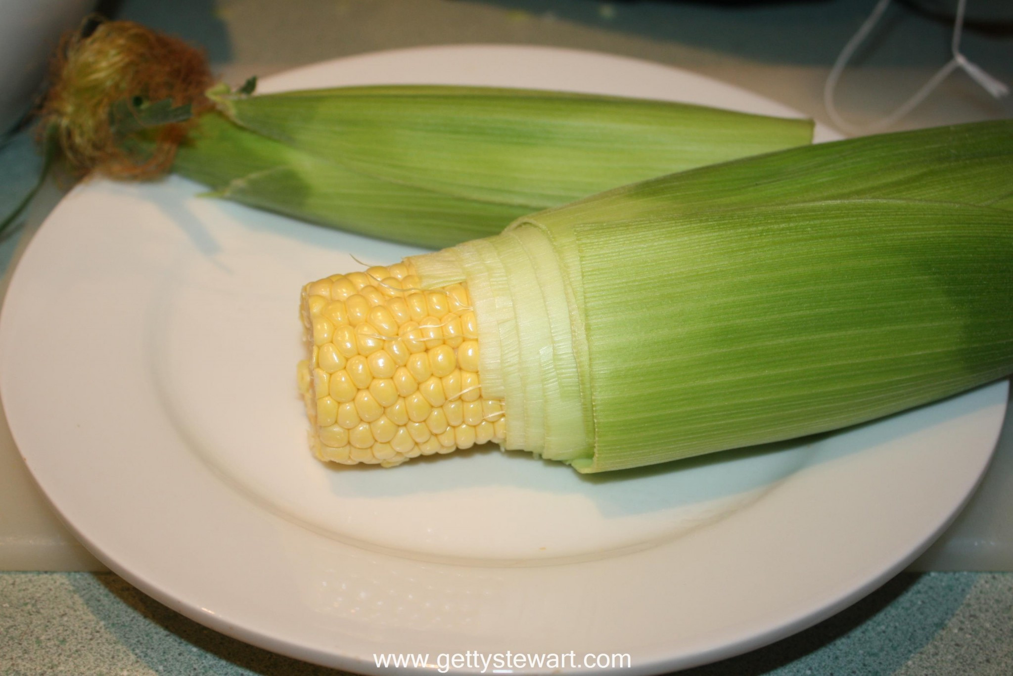 Microwave Corn In Husk
 Husking Sweet Corn in the Microwave Does it Work