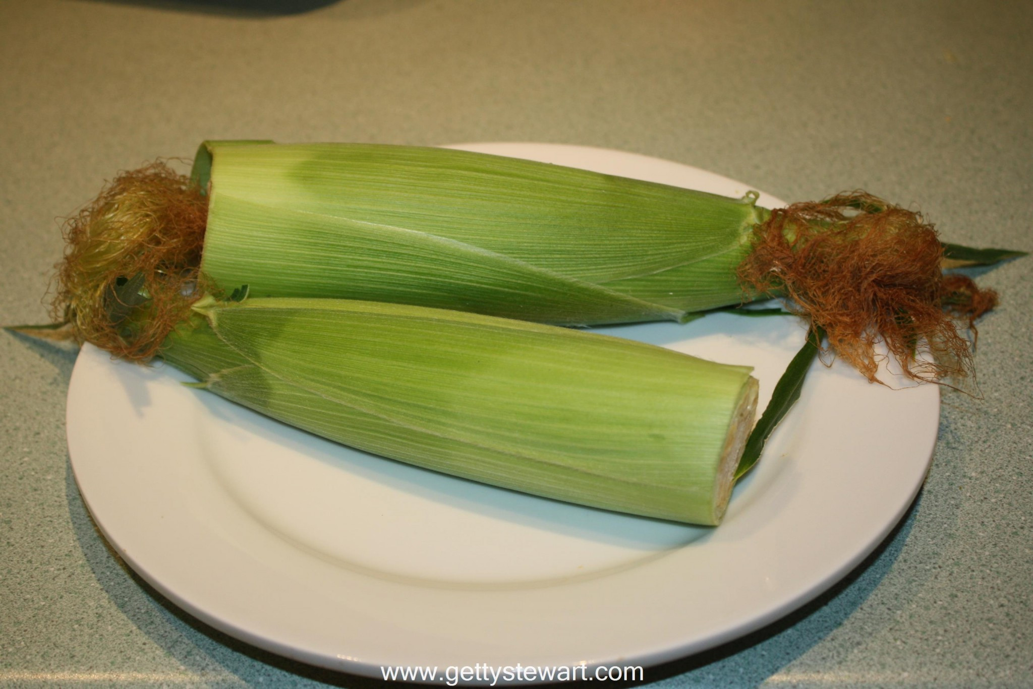 Microwave Corn In Husk
 Husking Sweet Corn in the Microwave Does it Work