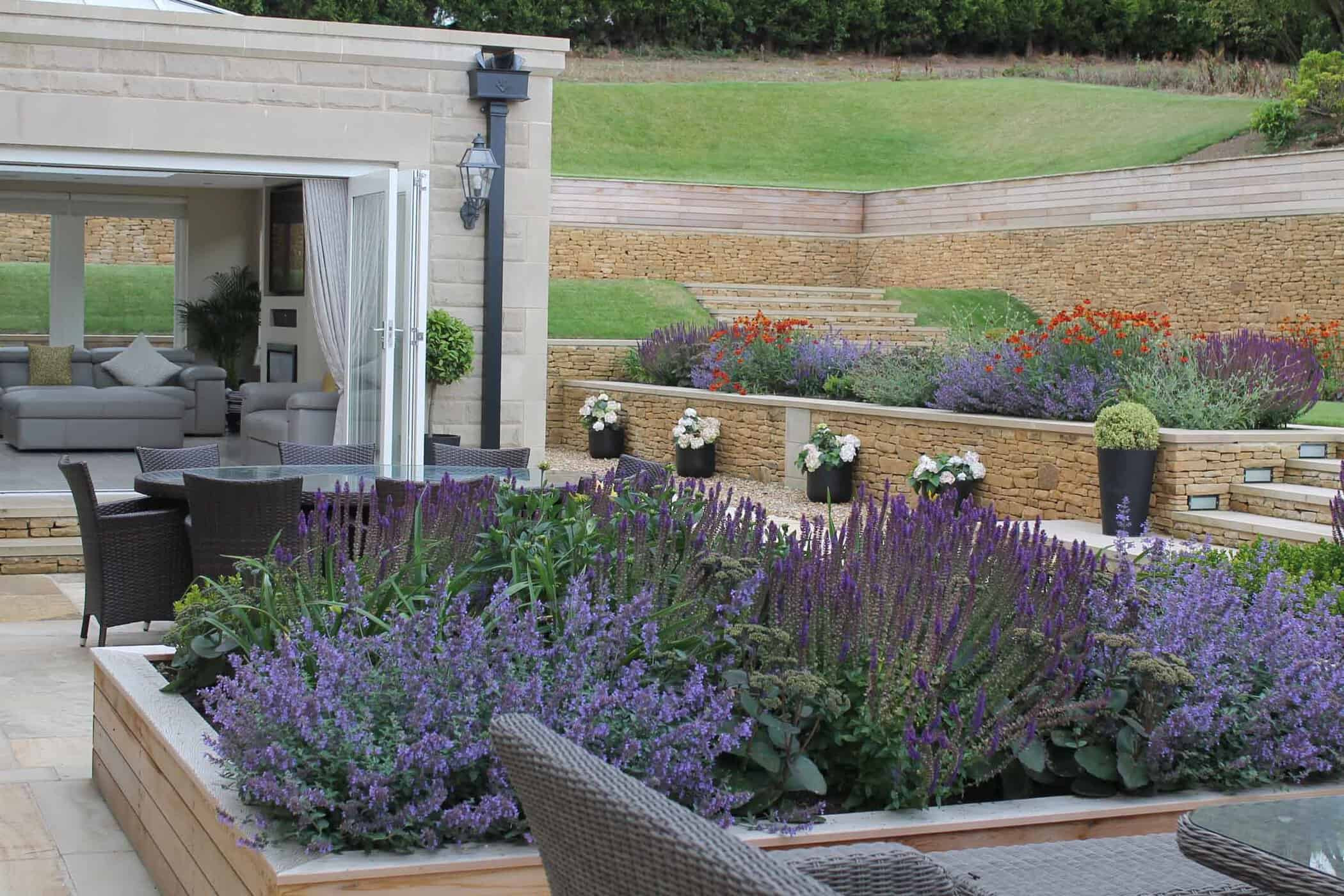 Modern Terrace Landscape
 Modern terraced garden with level lawns and colourful planting