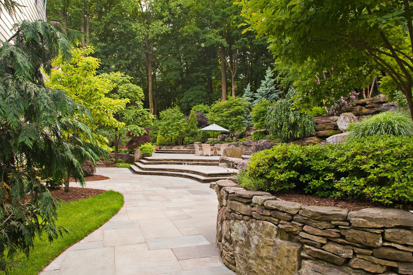 Natural Landscape Design
 Natural Stone Patio by Cording Landscape Design in NJ