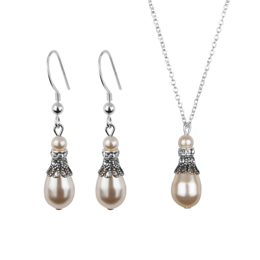 Necklace And Earring Sets
 crystal filigree and pearl earring and necklace set by