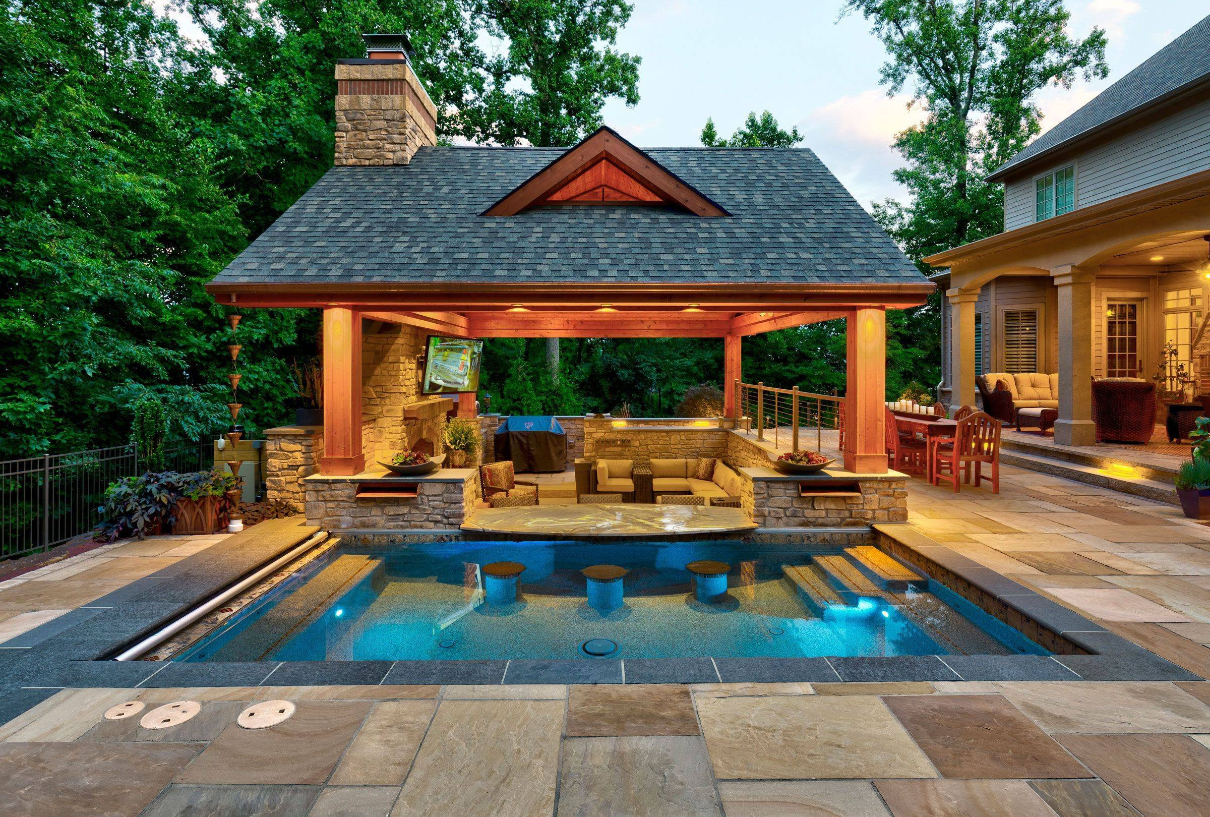 Outdoor Kitchen Designs With Pool
 Outdoor Kitchen With Swim Up Bar Huge Real Rock Waterfall