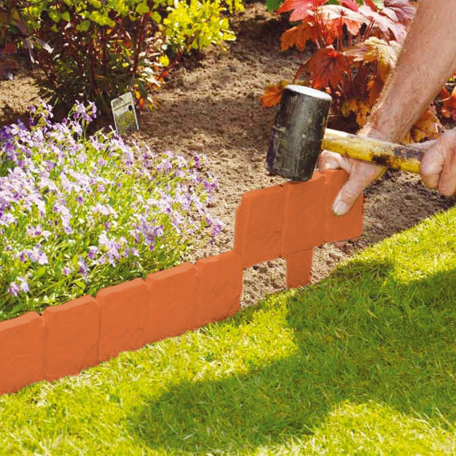 Outdoor Landscape Borders
 PLASTIC COBBLED STONE EFFECT GARDEN EDGING HAMMER IN TREE