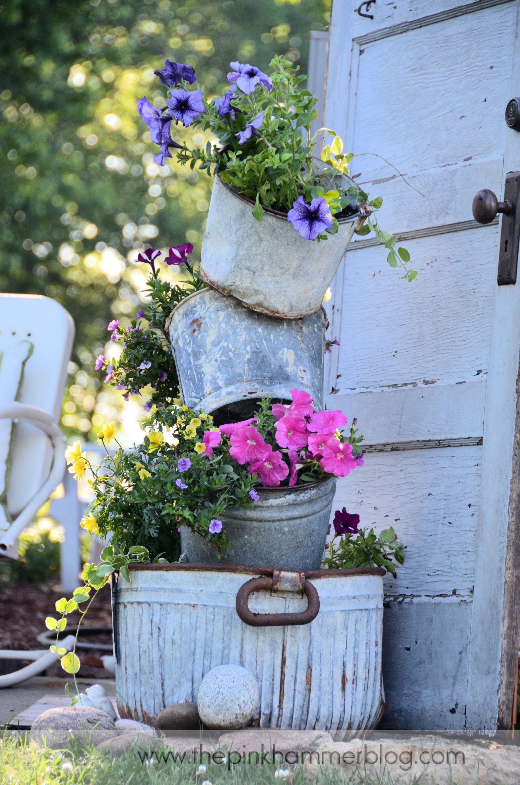 Outdoor Landscape Pots
 Primitive tipsy pot planters