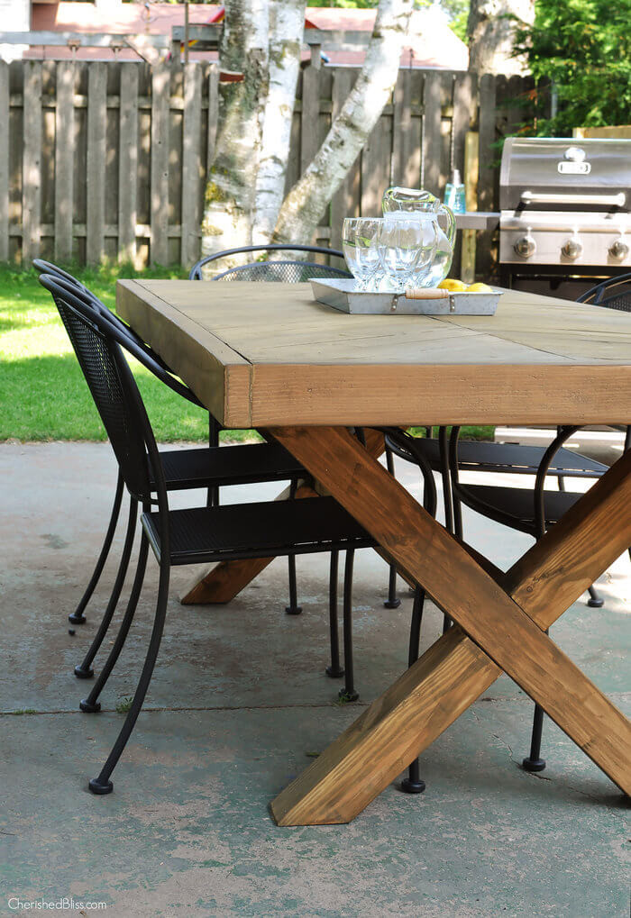 Outdoor Table DIY
 Outdoor Table with X Leg and Herringbone Top FREE PLANS