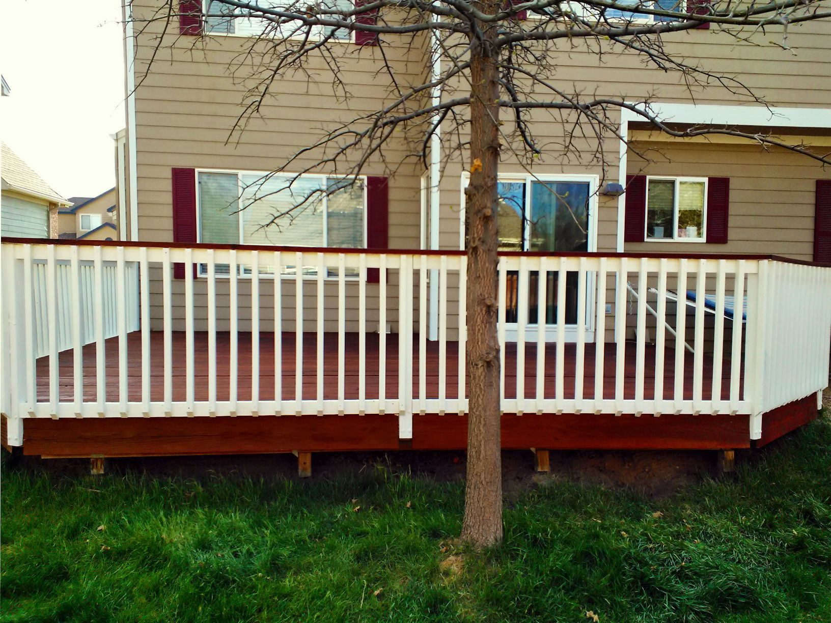 Painted Deck Rails
 A plete deck restore stained with TWP Rustic and white