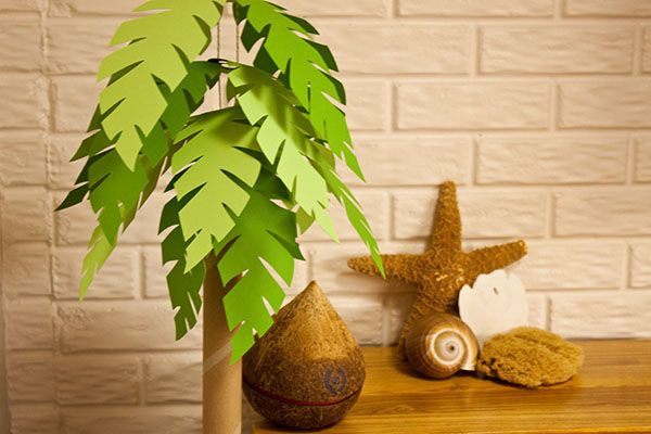 Palm Tree Decorations DIY
 Décor DIY Paper Palm Tree via Piggy Bank Parties