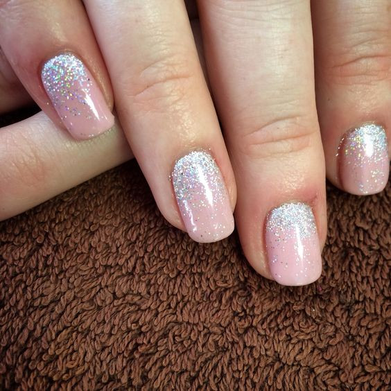 Pink And Silver Glitter Nails
 Lovely light pink nails ith silver glitter LadyStyle