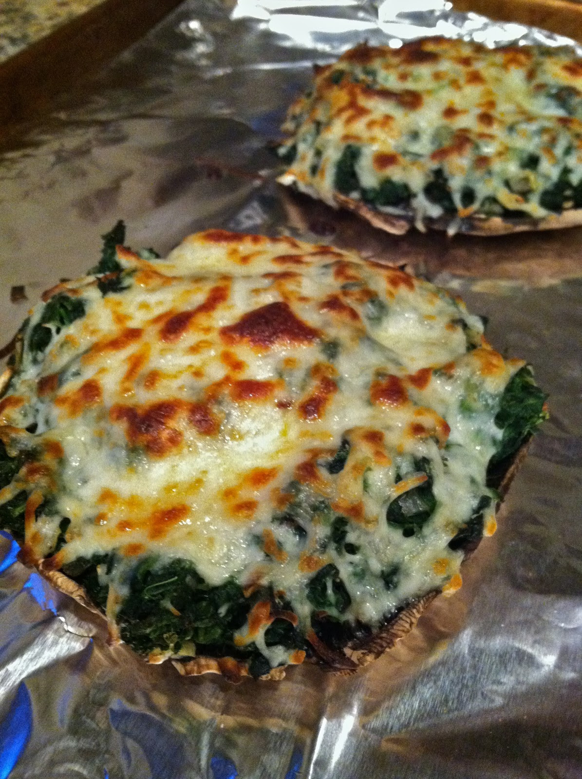 Portabello Stuffed Mushroom
 Cookin in Heels Cheesy Spinach Stuffed Portobello Mushrooms