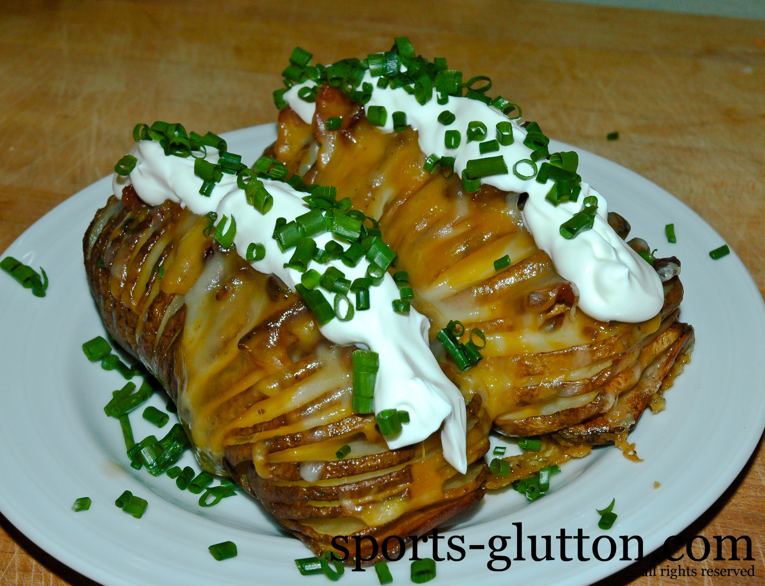 Potato On The Grill Recipe
 Grilled Hasselback Potatoes Stuffed With Bacon & Smothered