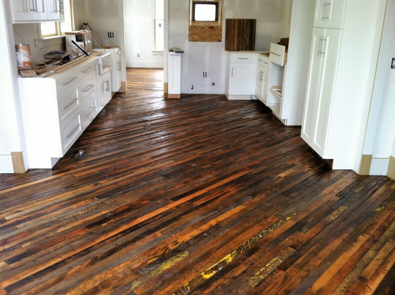 Reclaimed Barn Wood Flooring DIY
 Creative Home Flooring Ideas with Reused Pallets