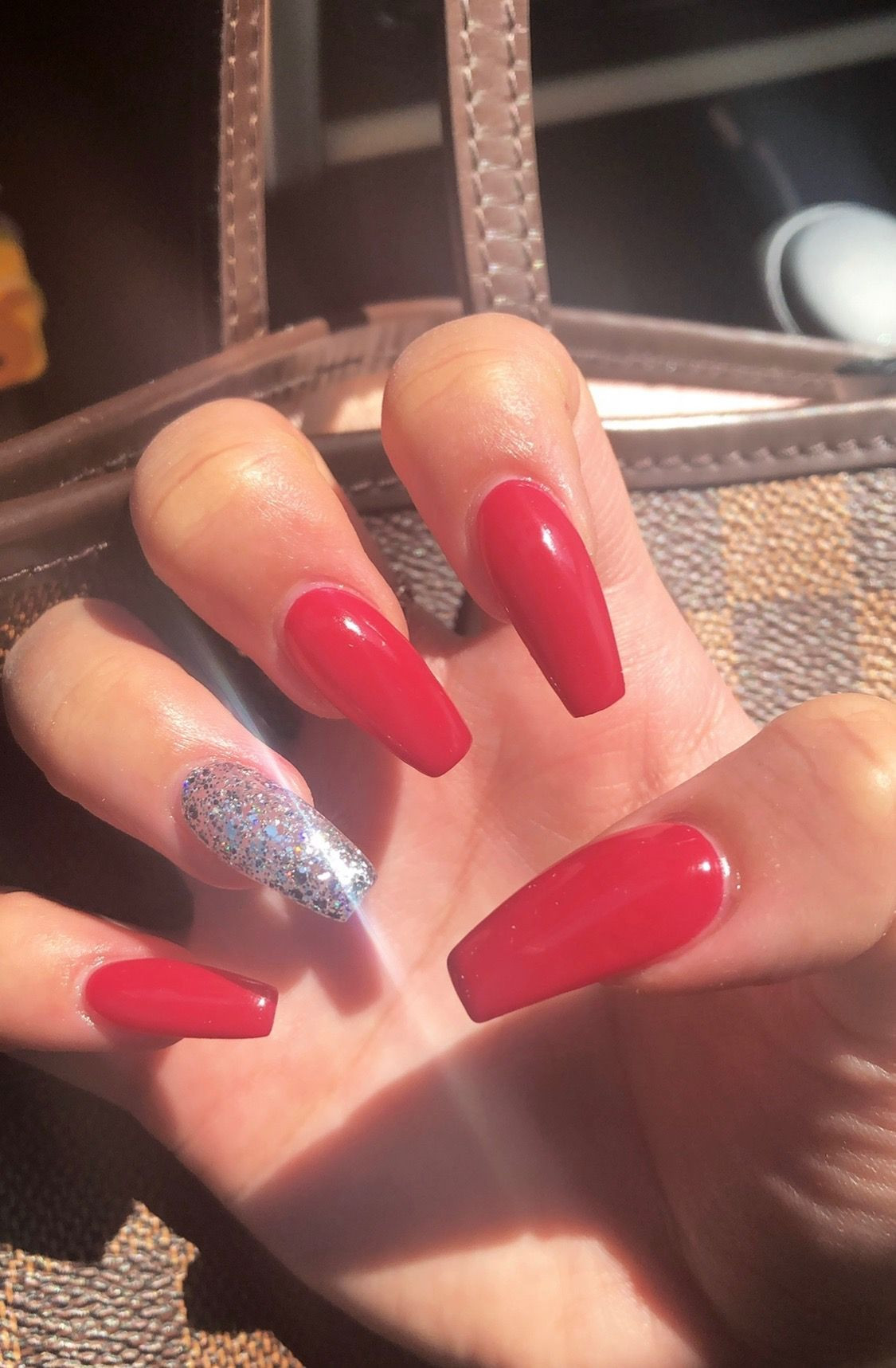 Red Nails With Silver Glitter
 Red coffin nails silver glitter