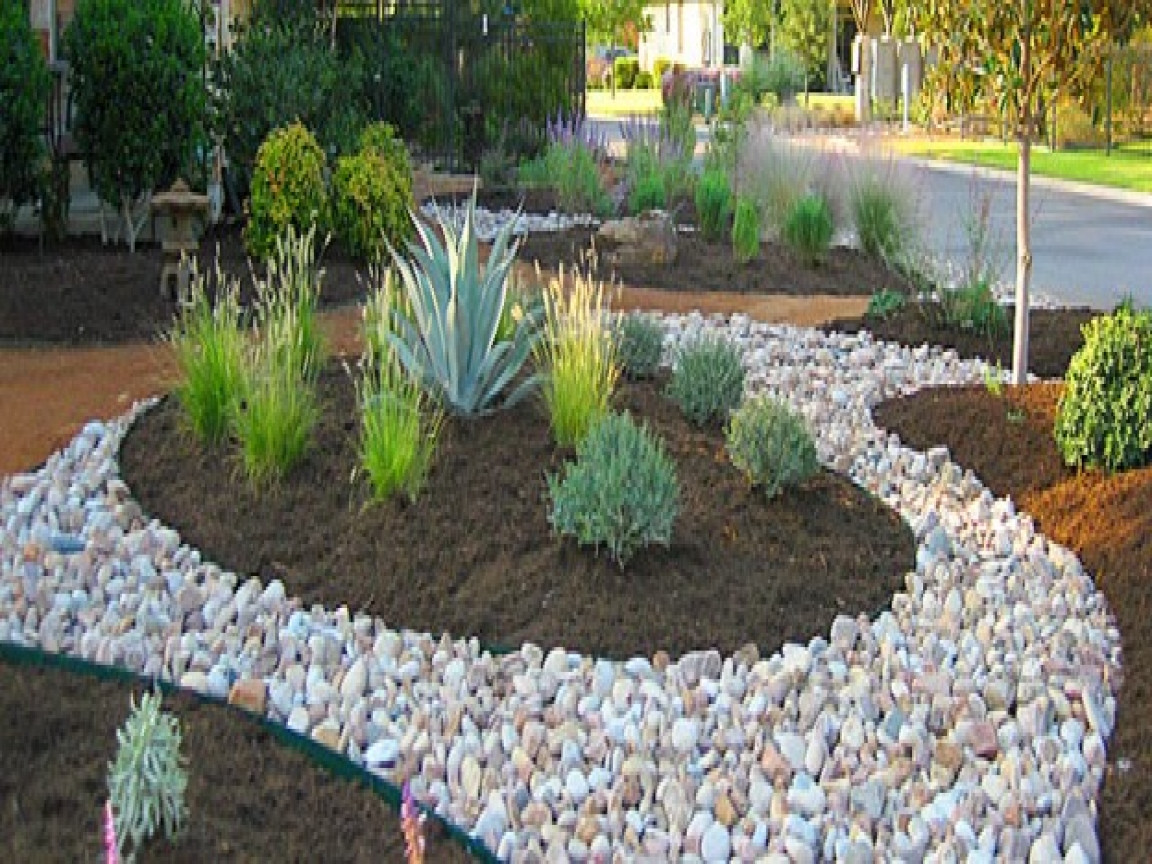 Rock Landscape Edging
 River rock garden edging ideas Video and s