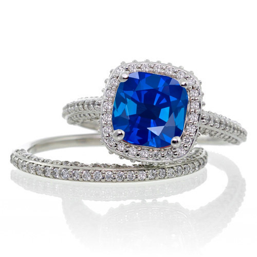 Sapphire Wedding Rings Sets
 2 5 Carat Cushion Cut Designer Sapphire and Diamond Halo