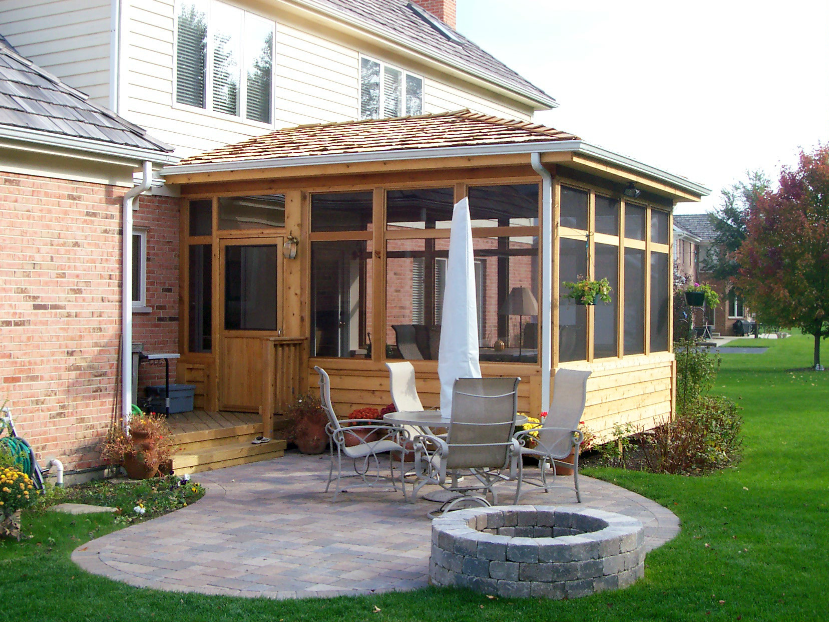 Screened In Backyard
 What roof style should your new Chicagoland porch or