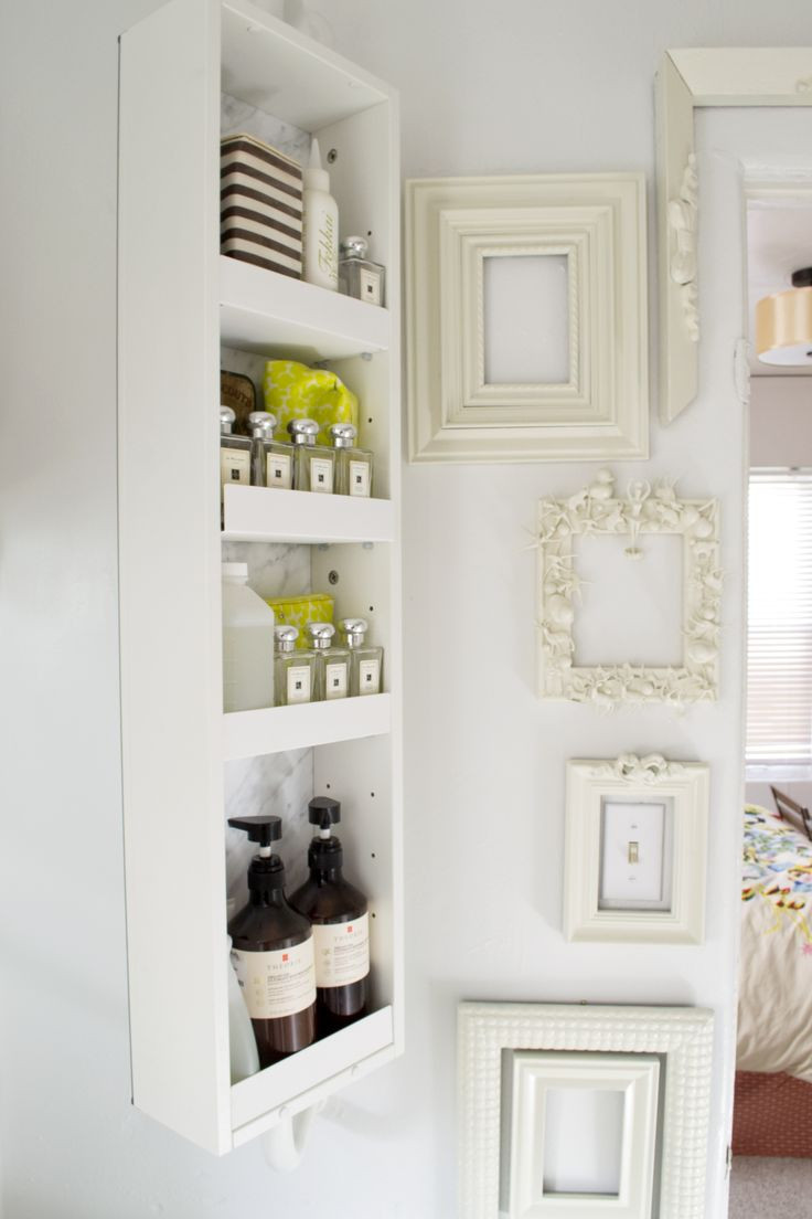 Shelves For Bathroom Wall
 15 Exquisite Bathrooms That Make Use of Open Storage