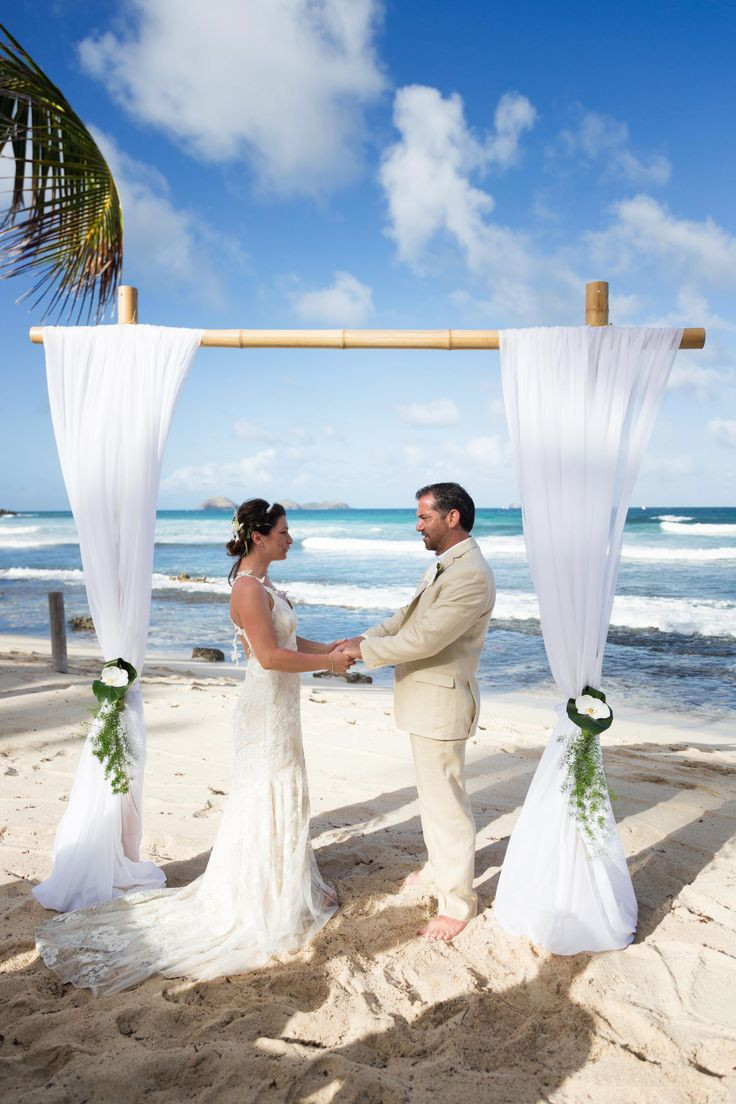 Simple Beach Wedding Ideas
 A simple and elegant beach wedding arch bamboo and white