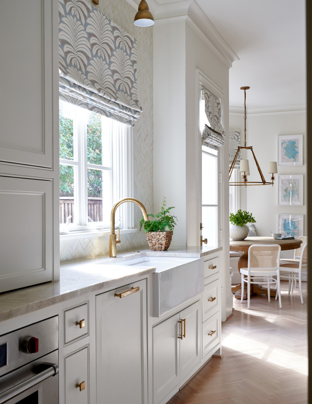 Small Kitchen Cabinet Set
 White cabinet storage with light blue roman shades and