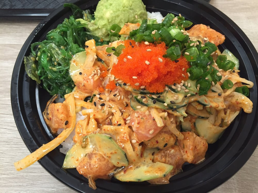 Smoked Salmon Poke Bowl
 Poke bowl with salmon smoked squid and da sauce Yelp