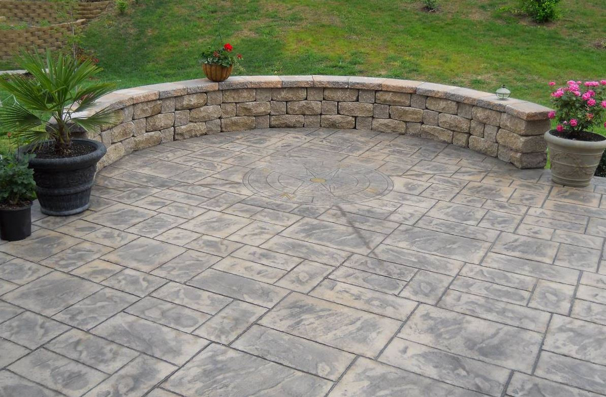 Stamped Concrete Backyard
 Gray Patio Backyard Stamped Concrete Rock Retaining Wall