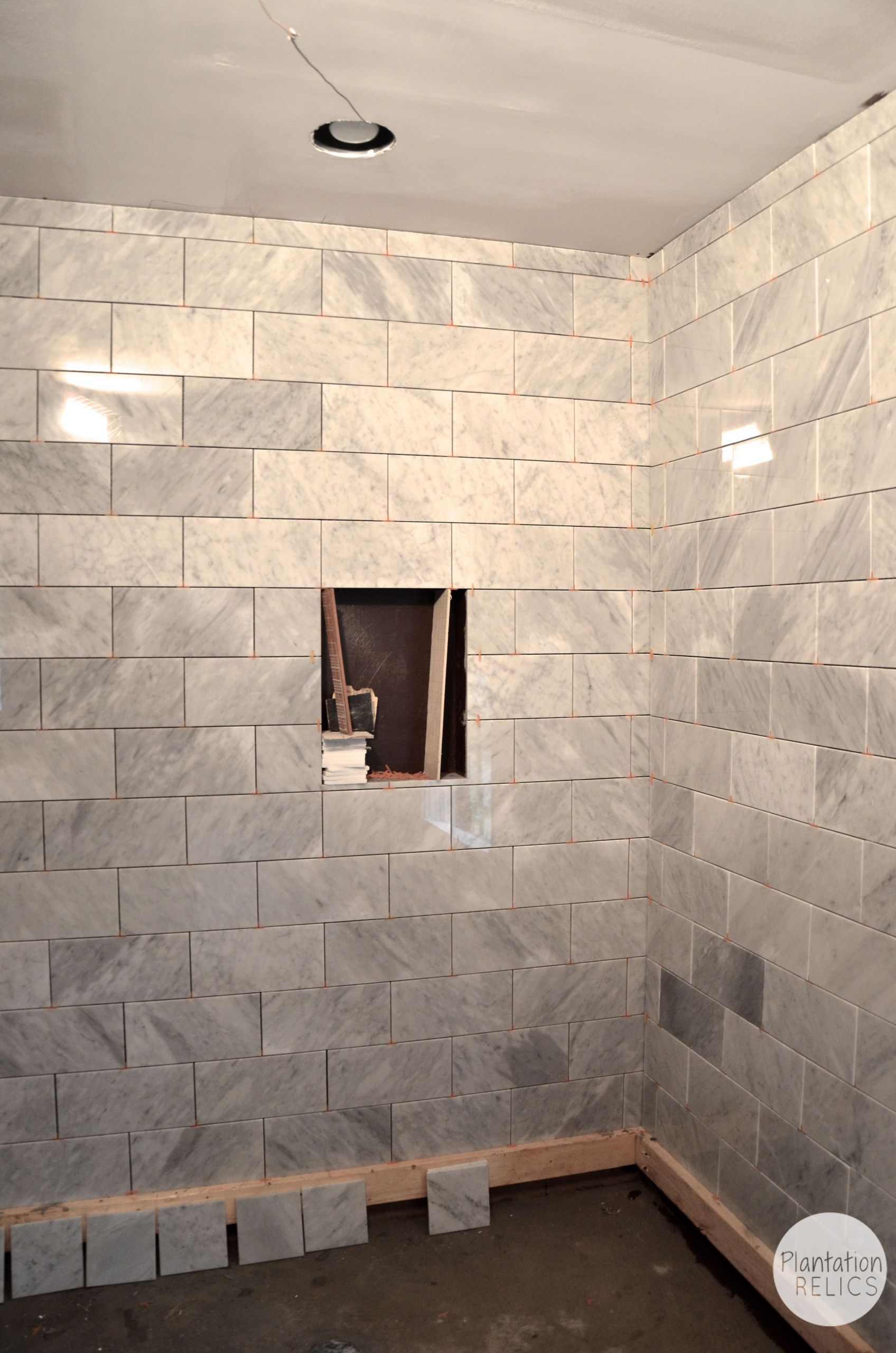 Stone Bathroom Showers
 Carrara Marble Master Bath Flip House Update