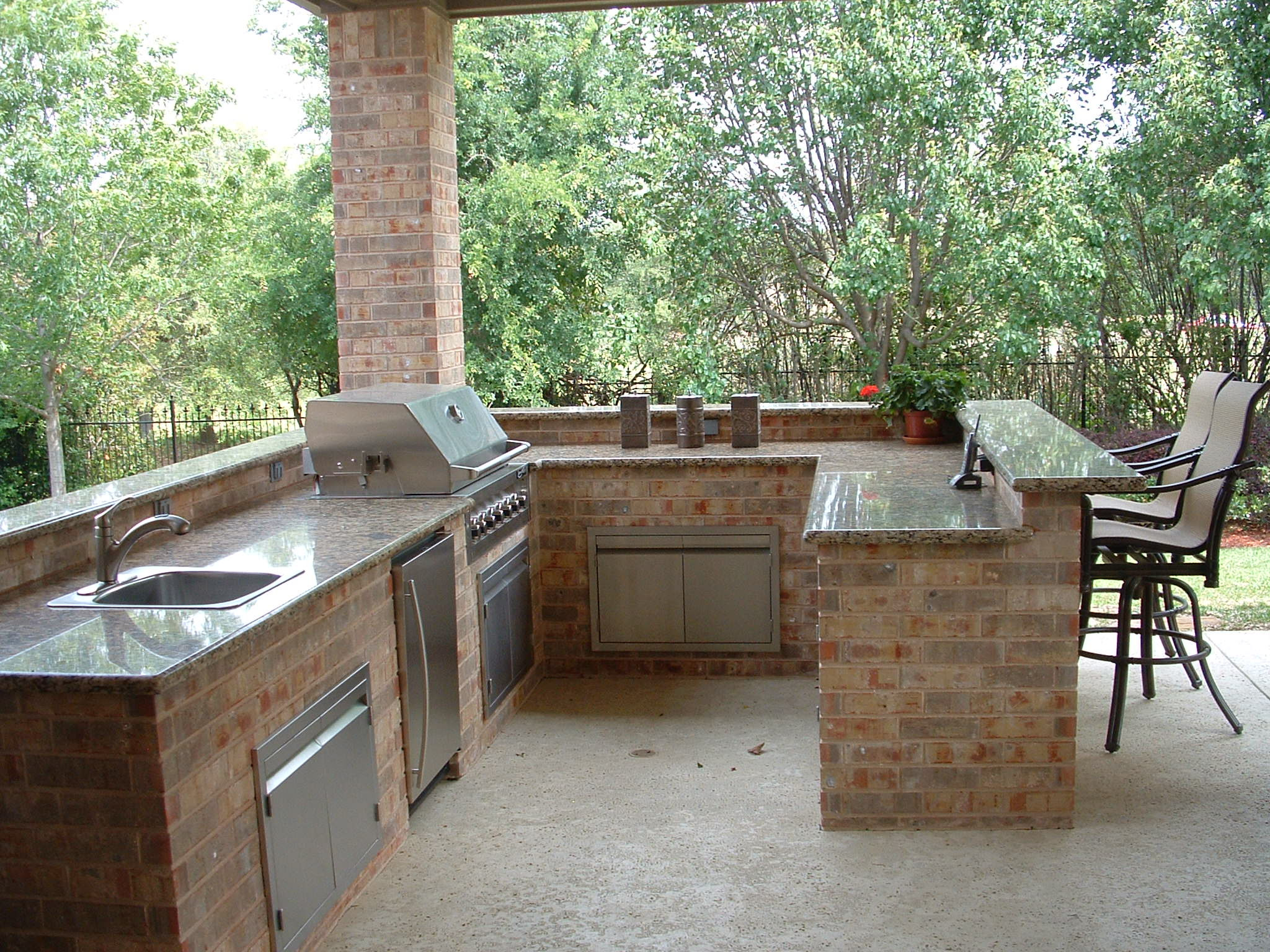 Stone Outdoor Kitchen
 Unique Spaces