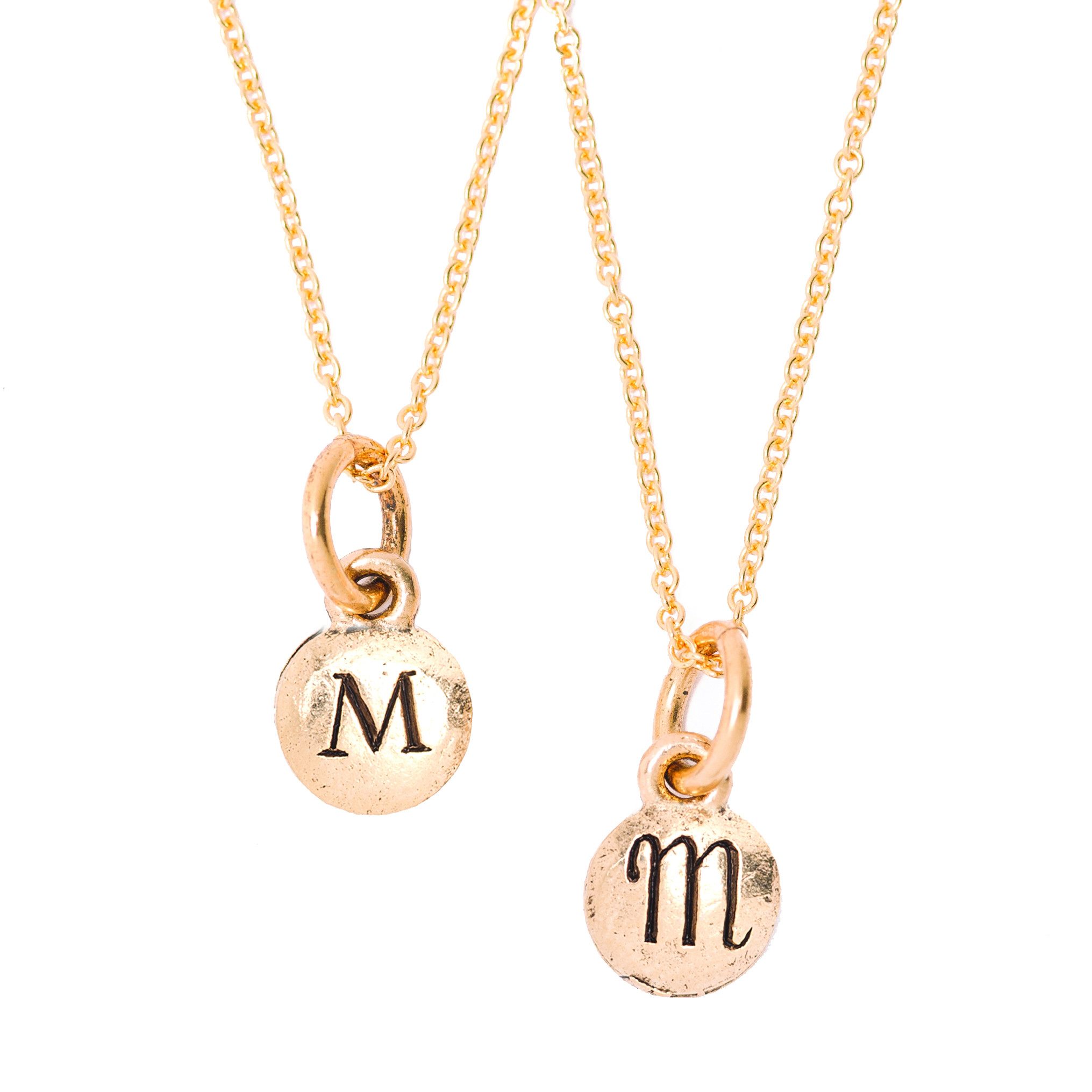 Tiny Charm Necklace
 Tiny Monogram Charm Necklace in Gold or Silver Merci B