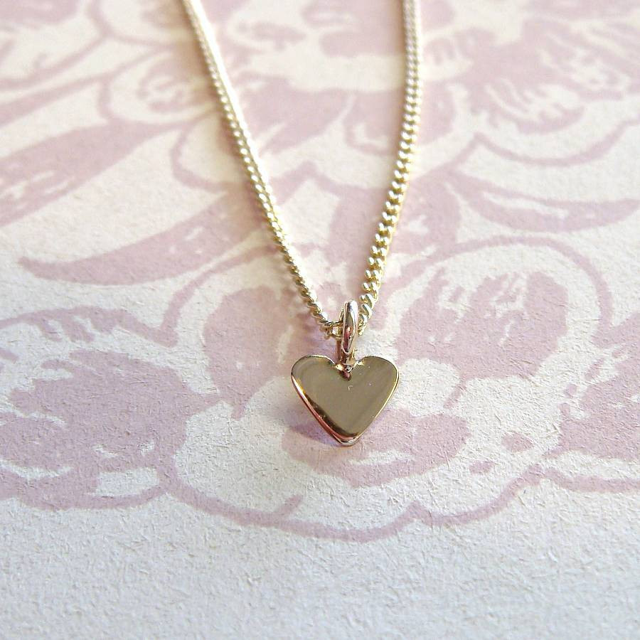 Tiny Charm Necklace
 tiny gold heart necklace by heather scott jewellery