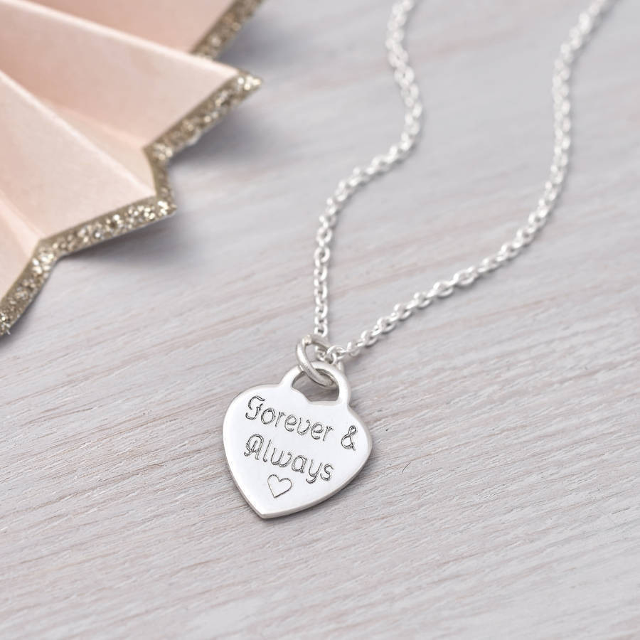 Tiny Charm Necklace
 personalised tiny sterling silver heart charm necklace by