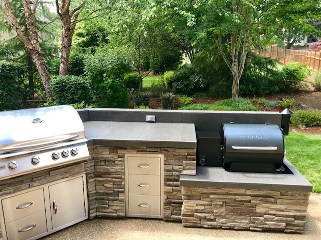 Traeger Outdoor Kitchen
 Traeger smoker in this outdoor kitchen by Sunset Outdoor