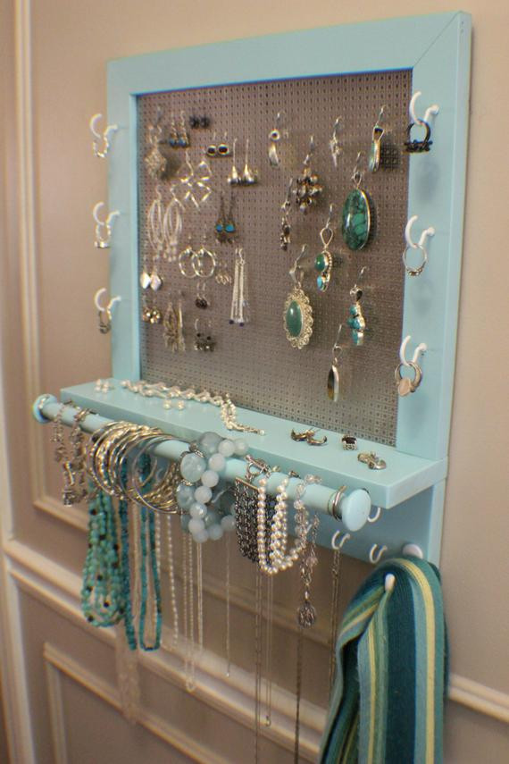 Wall Jewelry Organizer DIY
 Beautiful Turquoise Wall Mounted Jewelry Organizer with a
