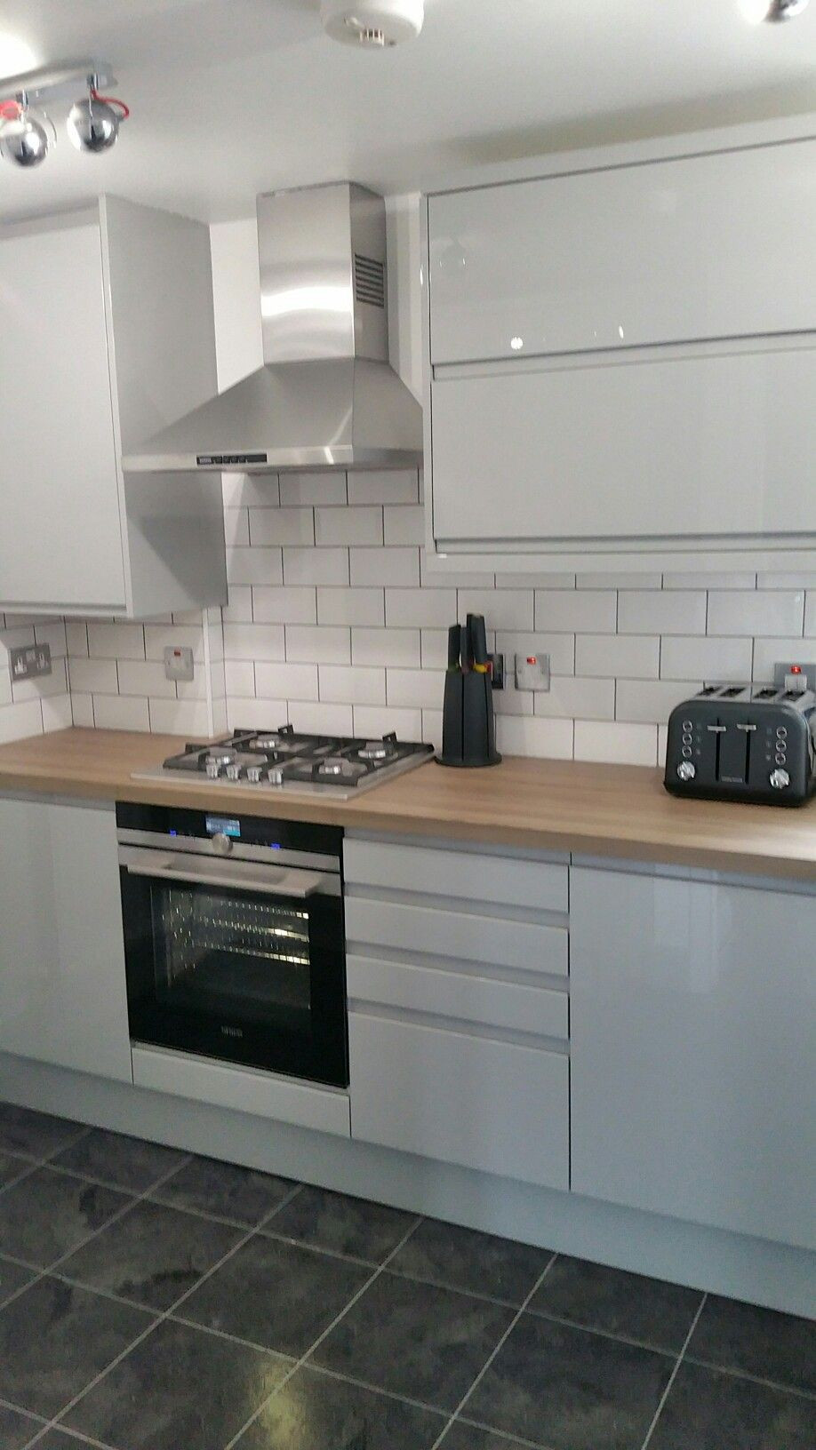 White Brick Kitchen
 Grey Gloss Kitchen White brick tiles