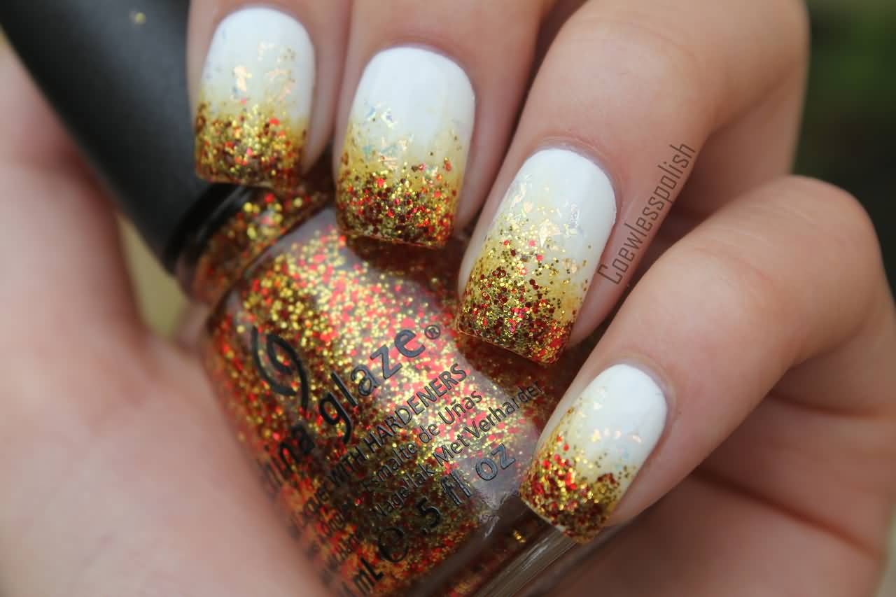 White Nails With Gold Glitter
 60 Most Beautiful Glitter Nail Art Ideas