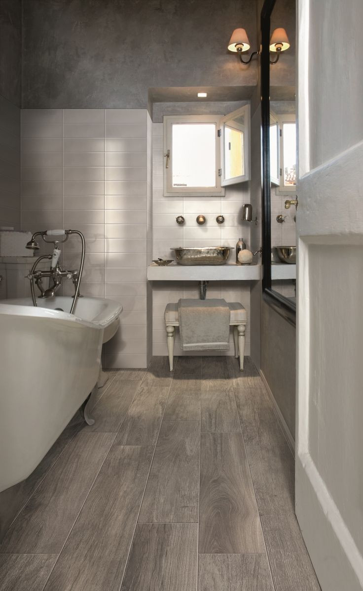 Wood Look Tile Bathroom Floor
 Wood Tile vs Real Wood Flooring – Interiors by Kelley Lively